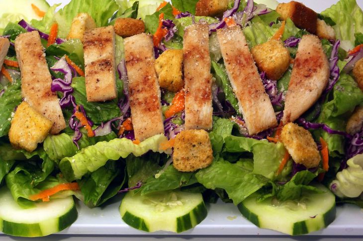 Caesar salad with chicken and croutons